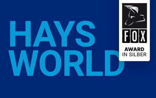 HaysWorld Logo auf blauem Hintergrund mit FOX Award Gewinner Teaser 